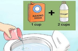 Sử dụng baking soda và giấm ăn để thông tắc bể phốt
